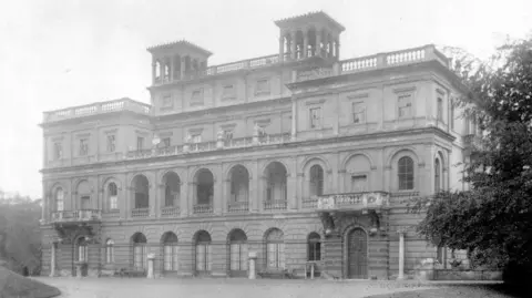 Sam Dawson A black and white image of Deepdene House in Dorking