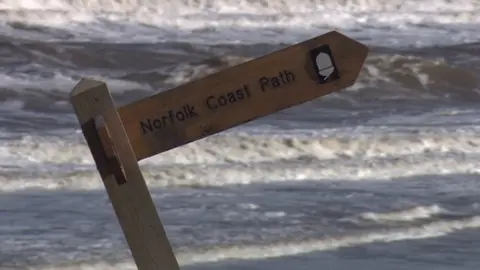 Wind battered sign at Hemsby