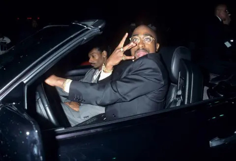 Getty Images Tupac and Snoop Dogg appear outside the American Music Awards in Los Angeles