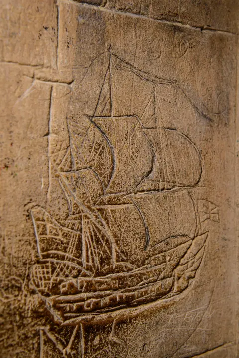 Lincoln Cathedral A ship with at least four sails is etched onto the wall of Lincoln Cathedral. 