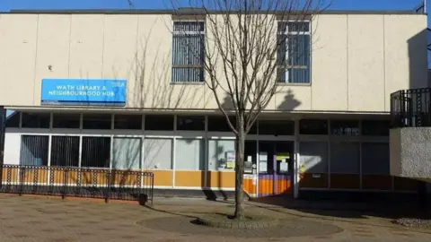 Rotherham Council A 1960s building with concrete panels and outdated windows overlooks a pedestrian street