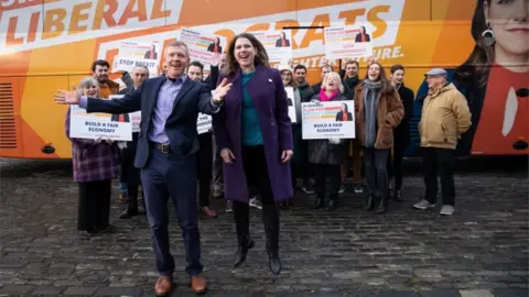 PA Media Willie Rennie and Jo Swinson
