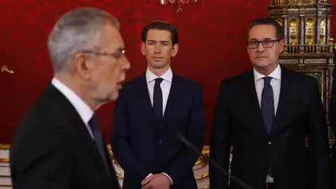 Reuters Austrian President Alexander van der Bellen (L) at swearing-in with Mr Kurz (C) and Mr Strache (R)