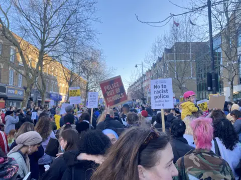 Protesters outside police station