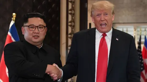 AFP Kim Jong-un and Donald Trump