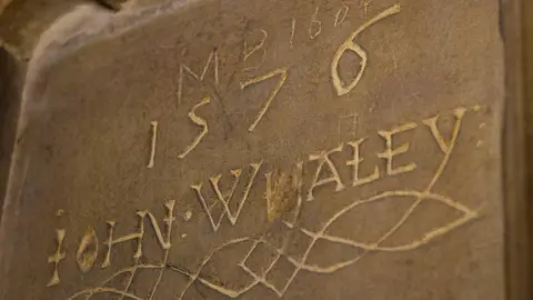 Lincoln Cathedral The year 1576 and the name John Whaley in capital letters is etched on a wall inside Lincoln Cathedral. 