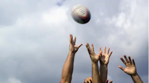 Getty Images Rugby Players Fighting for the Ball - stock photo