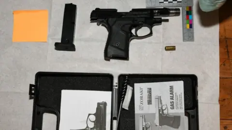 National Crime Agency Handgun and magazine