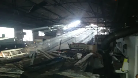 @HighgateFire Collapsed roof and damage