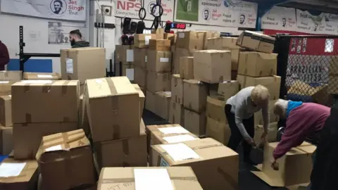 Jet Singh Trust The boxes being packed for the vans