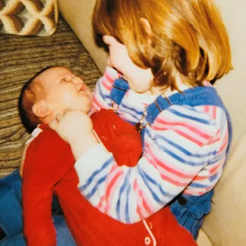 Marj Adams Amy with her big sister Kirsty