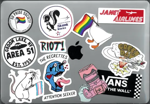 Thorsten Mjölnir Laptop with a range of stickers