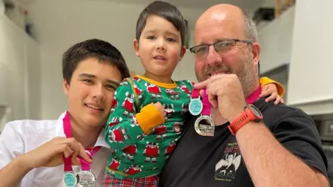 Simon Lambert Archie and his family