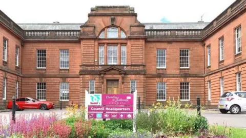 The large sandstone headquarters of Dumfries and Galloway Council