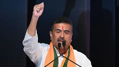 Bharatiya Janata Party (BJP) leader and newly selected Chief Minister of West Bengal Suvendu Adhikari gestures during a party meeting in Kolkata on May 8, 2026. 