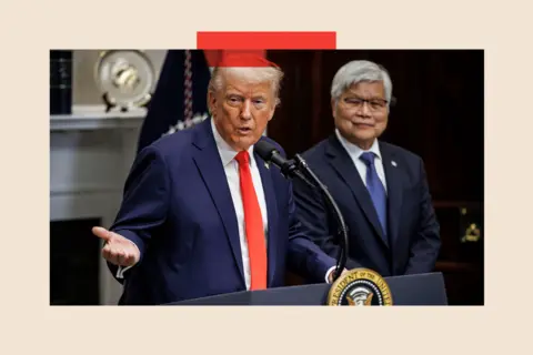 Getty Donald Trump standing in front of a podium