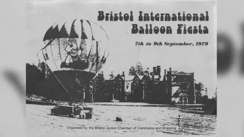 Richard Cardy A black and white picture of a hot air balloon on one side, row of houses in the background and the text reading Bristol International Balloon Fiesta., 7th to 9th September 1979.