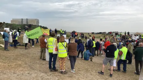 Jenny Kirk/BBC Protesters on Sizewell beach