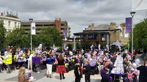 Crowds gathered for a community street party