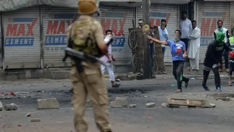 AFP Kashmiri protestors clash with Indian police in Srinagar on July 10, 2016.