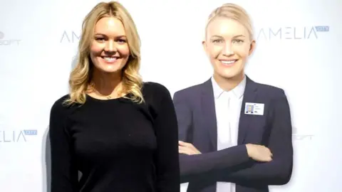 IPsoft Lauren Hayes standing next to Amelia