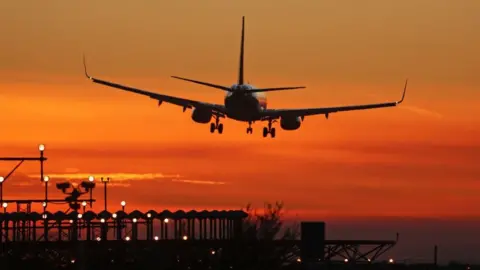 Getty Images Ryanair plane landing in an airport in Barcelona in January 2024