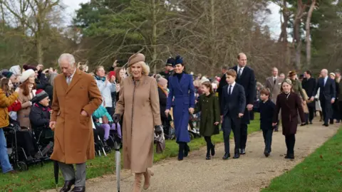 PA Media King Charles III, Queen Camilla, the Princess of Wales, Princess Charlotte, Prince George, the Prince of Wales and Prince Louis attending the Christmas Day morning church service at St Mary Magdalene Church