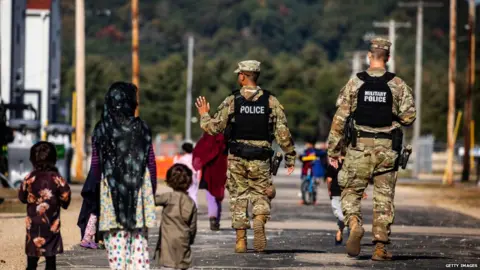 Getty Images Afghan refugees have been settled in Fort McCoy, Wisconsin, a US army base