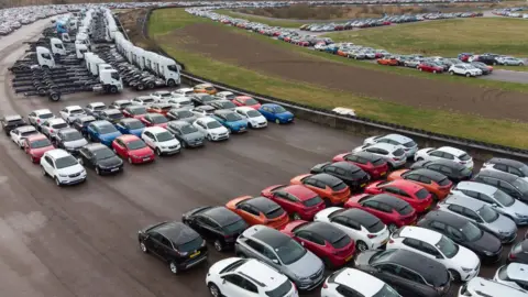 PA Media Cars stored at the Rockingham Motor Speedway circuit