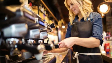 Getty Images Female barista