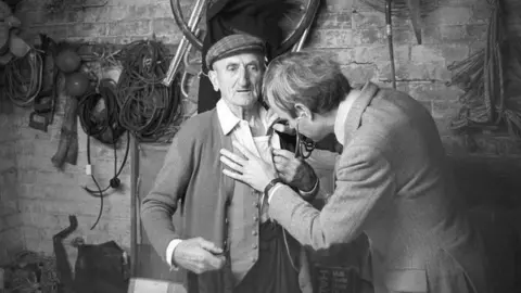 Digital scan, Beaford Arts Dr Richard Westcott listening to his patient Bill Brown's chest