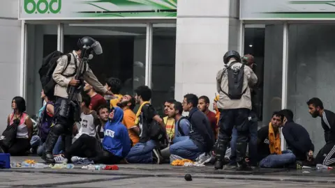 EPA Authorities arrest opposition demonstrators during a protest in Caracas. 29 June 2017