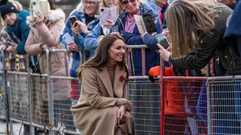 PA Media The Princess of Wales with members of the public as she arrives for a visit to The Street, in Scarborough