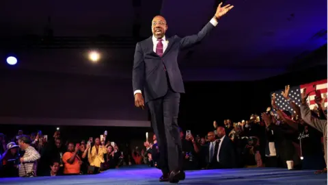 Getty Images Georgia Democratic Senate candidate US Sen. Raphael Warnock speaks during an election night watch party