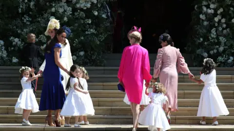 PA Pagesboys and bridemaids on steps of St George's Chapel