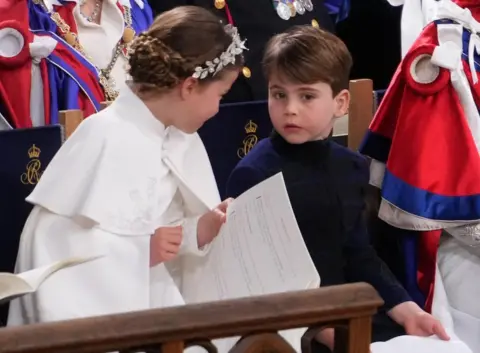 PA Media Princess Charlotte and Prince Louis at the Coronation at Westminster Abbey