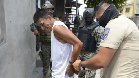 AFP Security forces detain a suspect during security operations in southern Guayaquil, Ecuador on October 19, 2021