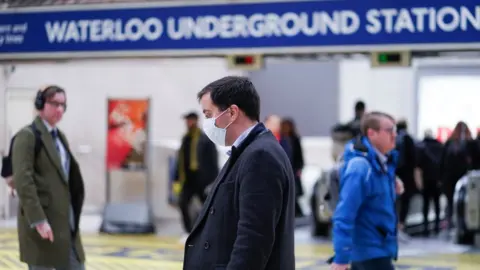 Reuters Man wearing mask on London Underground