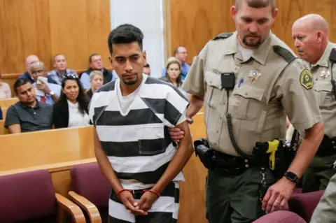 Reuters The suspect appears in court