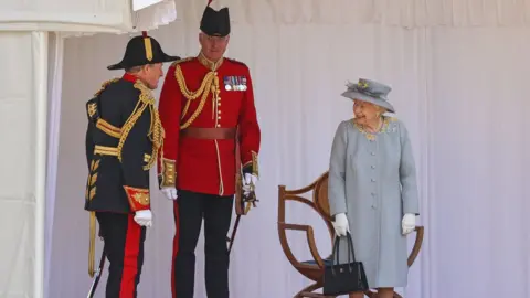 PA Media Queen Elizabeth II during a ceremony at Windsor Castle in Berkshire to mark her official birthday.