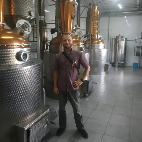 ATOMIK Kyrylo Korychenskyi at the distillery before the war in Ukraine