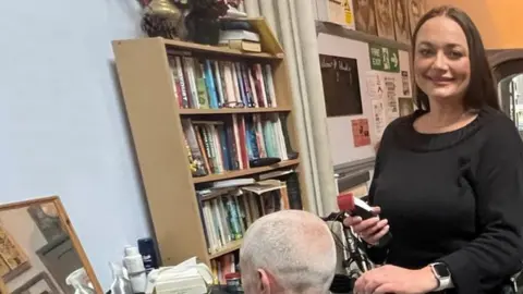 St Petrock's Rhi Belcher with a client