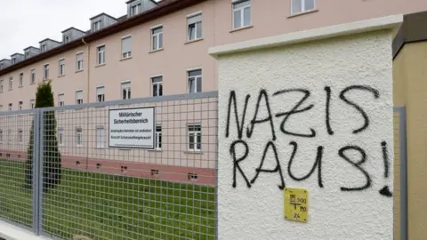 EPA Letters reading "Nazis Raus!" (Nazis out!) on a fence near the main gate of the Fuerstenberg barracks in Donaueschingen, Germany, 07 May 2017.