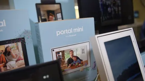 Getty Images A selection of Portal devices and their boxes are arrayed on a table