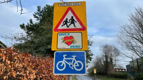 BBC School speed limit sign