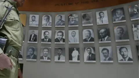 Getty Images An Ethiopian soldier stands inside the Martyrs Memorial to the "Red Terror" at the Holy Trinity Church in Addis Ababa, Ethiopia on 24 February 2004.