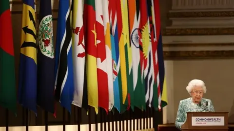 PA The Queen speaks at the formal opening of the Commonwealth Heads of Government Meeting
