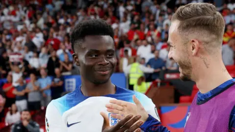 Bukayo Saka and James Maddison after England's Euro 2024 qualifying victory over North Macedonia