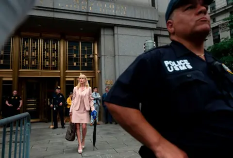 Getty Images Sigrid McCawley, leaves US Federal Court on July 18, 2019