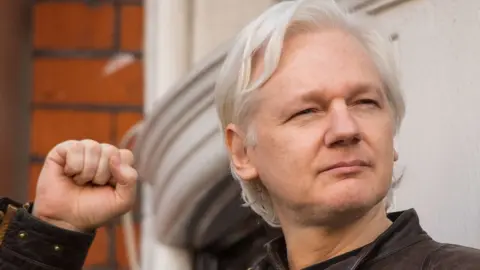 PA Media Julian Assange